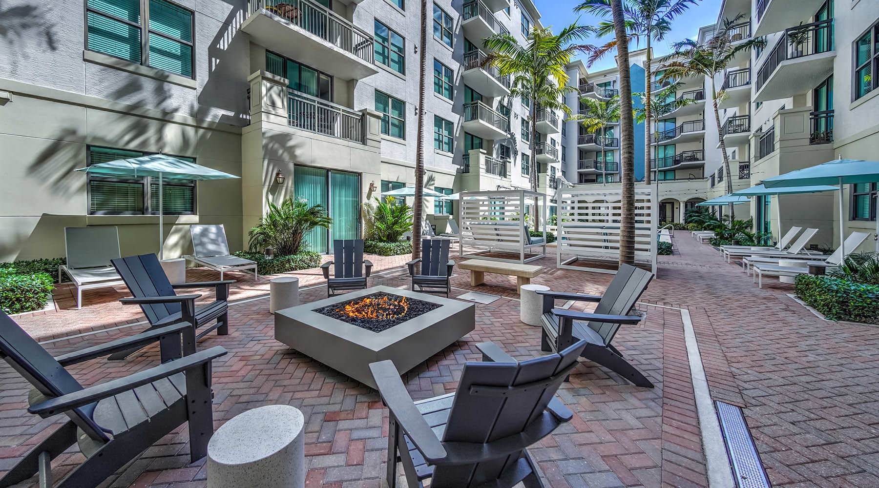 Feel at Home fire pit seating in courtyard